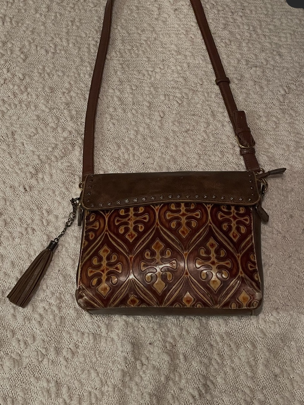Brown Patterned Leather Crossbody with Tassel Accent